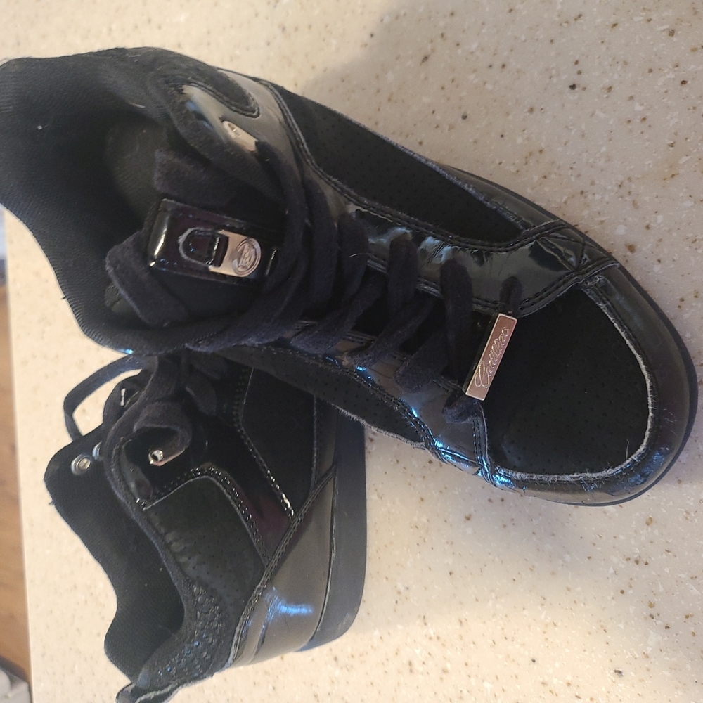 Black high top Cadillac athletic sneakers 👟